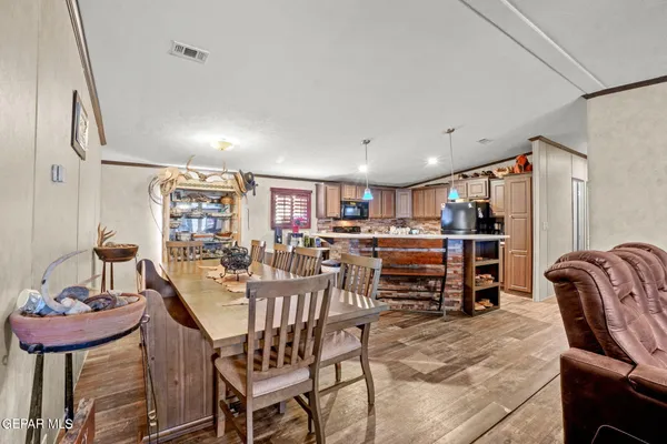 a view of a dining room with furniture