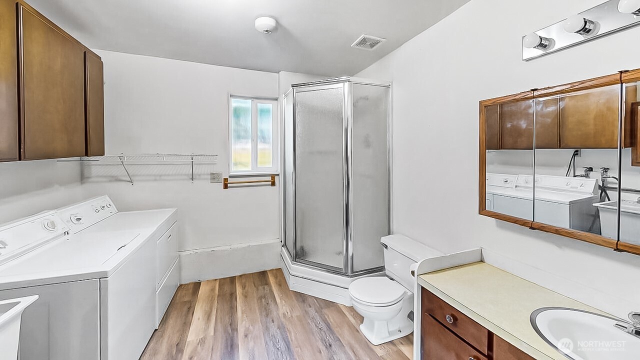 14835 Valley View Drive Mount Vernon, WA 98273 - Photo 15 of 25 a bathroom with a sink a toilet and shower