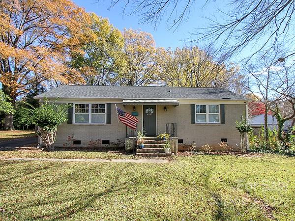 4327 Applegate Road Charlotte, NC 28209 - Photo 1 of 29 a front view of a house with a yard
