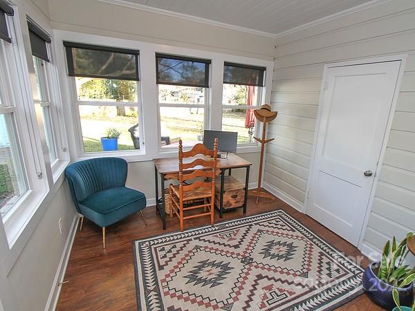 4327 Applegate Road Charlotte, NC 28209 - Photo 14 of 29 a workspace room with furniture and a rug