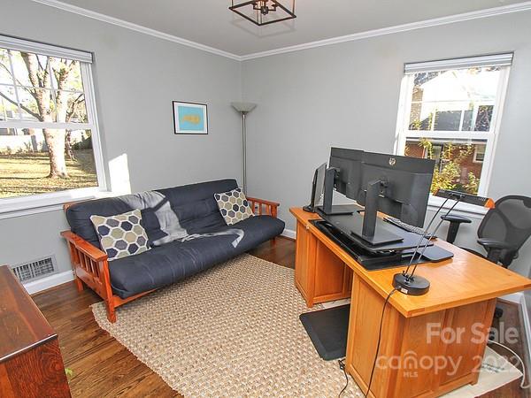 4327 Applegate Road Charlotte, NC 28209 - Photo 17 of 29 a living room with a couch and windows