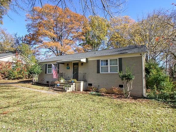 4327 Applegate Road Charlotte, NC 28209 - Photo 2 of 29 a view of a house with a yard covered in snow