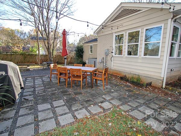 4327 Applegate Road Charlotte, NC 28209 - Photo 23 of 29 a view of a house with backyard and sitting area