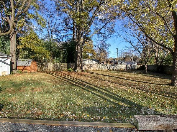 4327 Applegate Road Charlotte, NC 28209 - Photo 28 of 29 a view of a yard with large trees