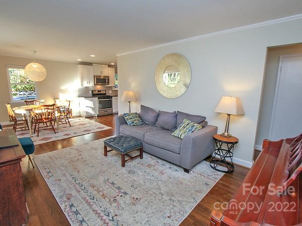 4327 Applegate Road Charlotte, NC 28209 - Photo 5 of 29 a living room with furniture and a table