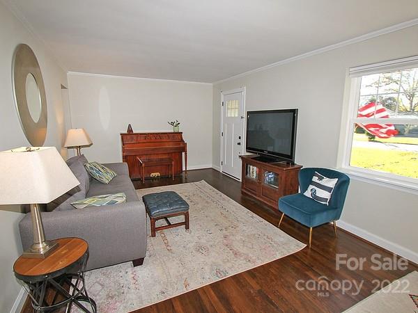 4327 Applegate Road Charlotte, NC 28209 - Photo 6 of 29 a living room with furniture and a flat screen tv