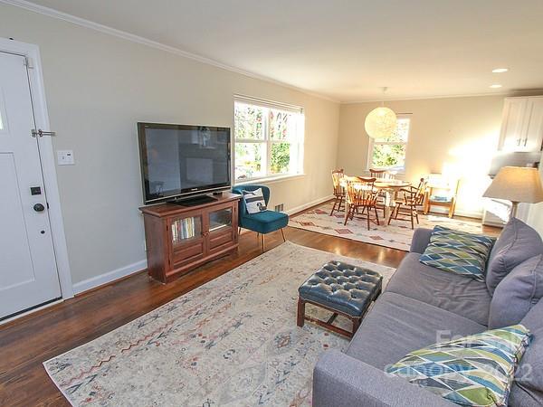 4327 Applegate Road Charlotte, NC 28209 - Photo 7 of 29 a living room with furniture and a flat screen tv