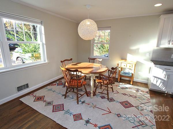 4327 Applegate Road Charlotte, NC 28209 - Photo 8 of 29 a view of a dining room with furniture and a window