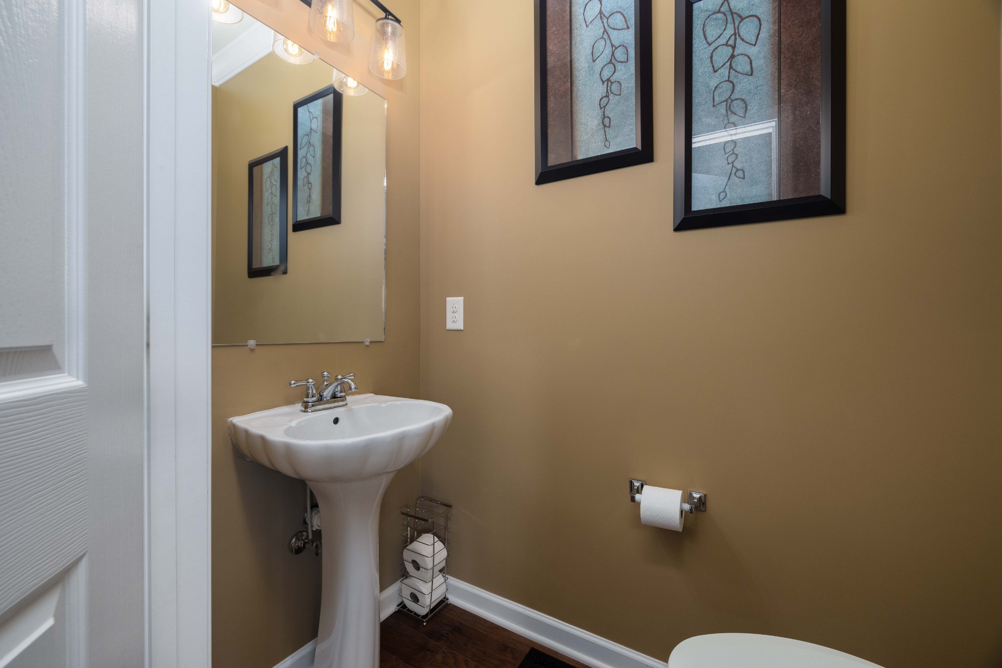 2736 McLemore Road Franklin, TN 37064 - Photo 22 of 50 a bathroom with a toilet sink and mirror