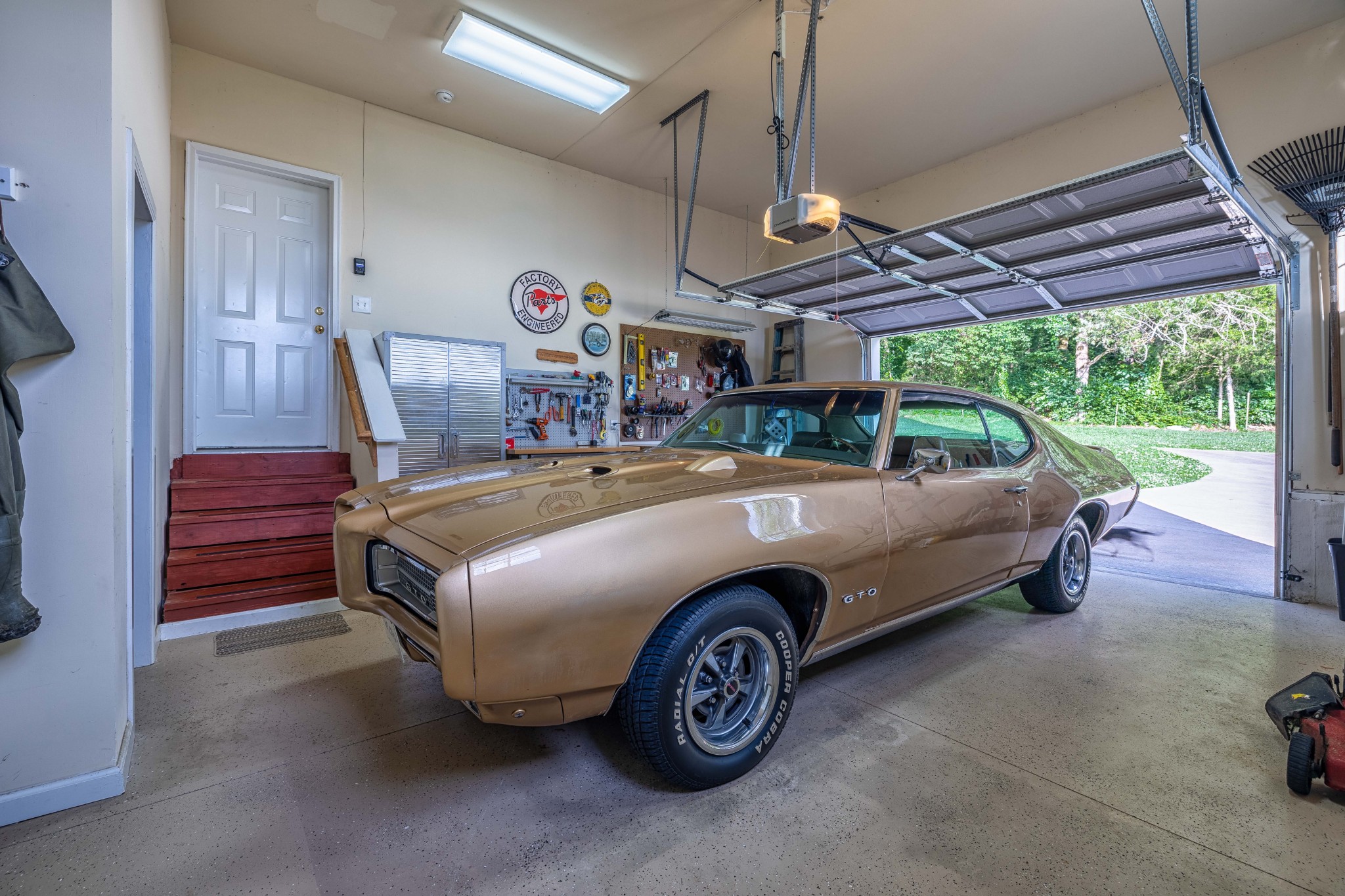 2736 McLemore Road Franklin, TN 37064 - Photo 29 of 50 a car is parked in a garage