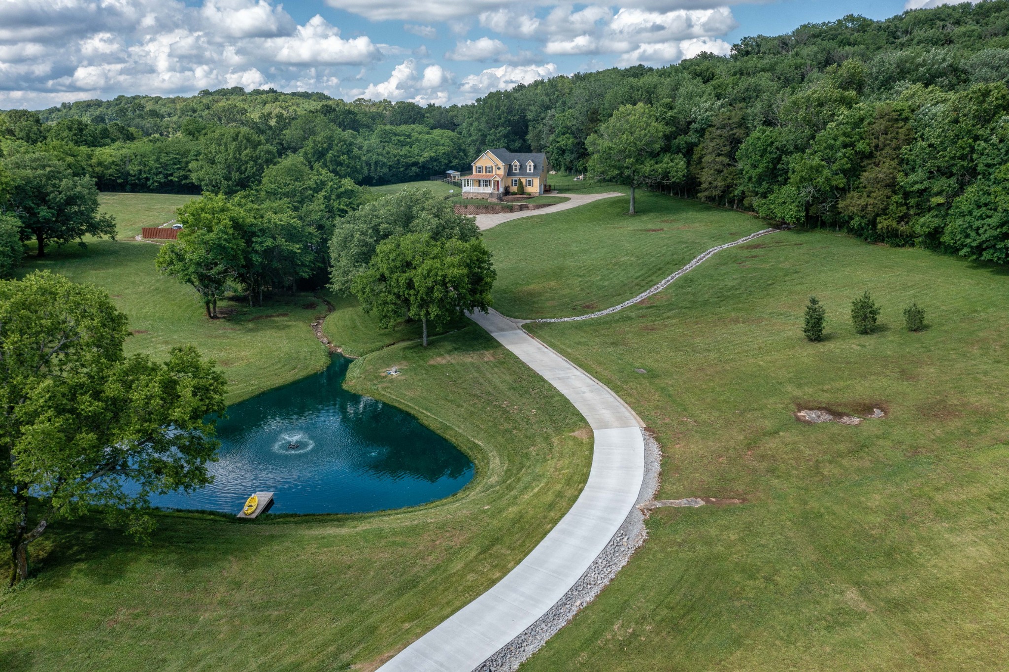 2736 McLemore Road Franklin, TN 37064 - Photo 33 of 50 a view of a house with a yard