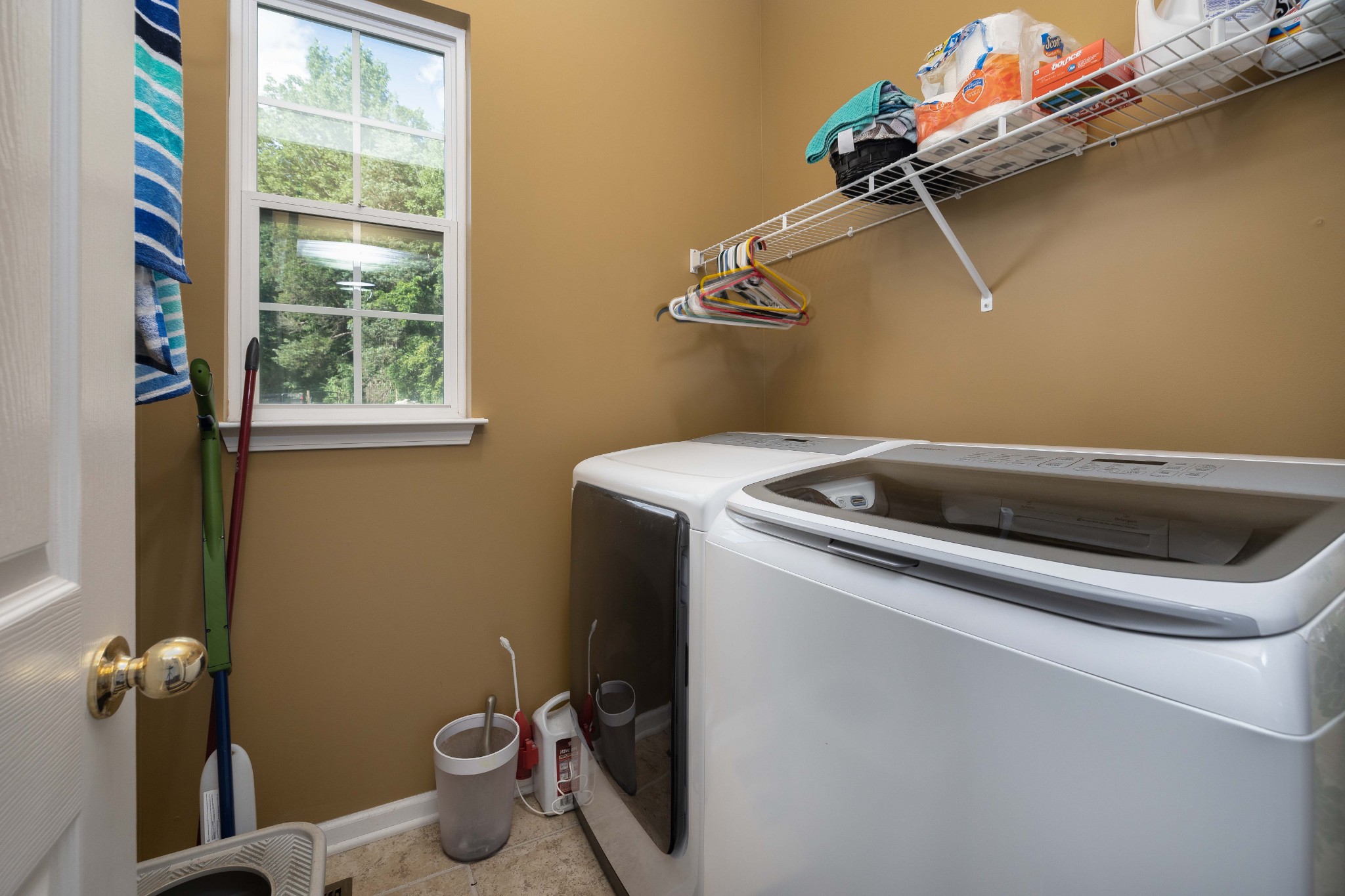 2736 McLemore Road Franklin, TN 37064 - Photo 9 of 50 a utility room with dryer and washer