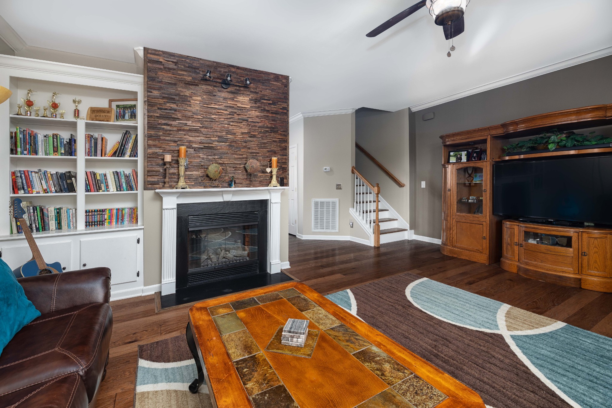 2736 McLemore Road Franklin, TN 37064 - Photo 10 of 50 a living room with furniture and a fireplace
