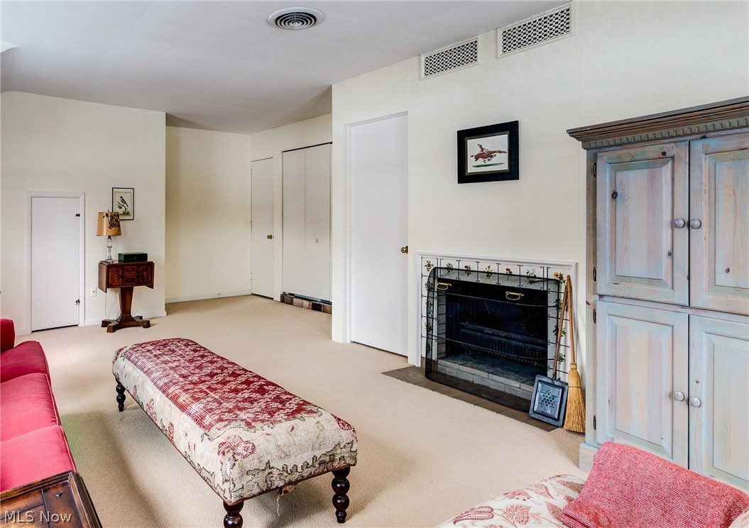 13753 County Line Road Novelty, OH 44072 - Photo 18 of 31 The second floor family room has a fireplace and space for a variety of activities.