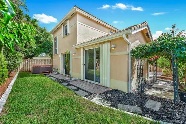 a view of a bike storage and utility room