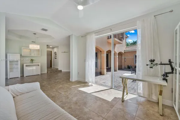 a living room with furniture and a table