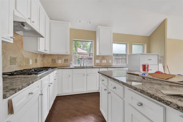 $480,000 | 19 South Scarlet Elm Court, The Woodlands, TX 77382