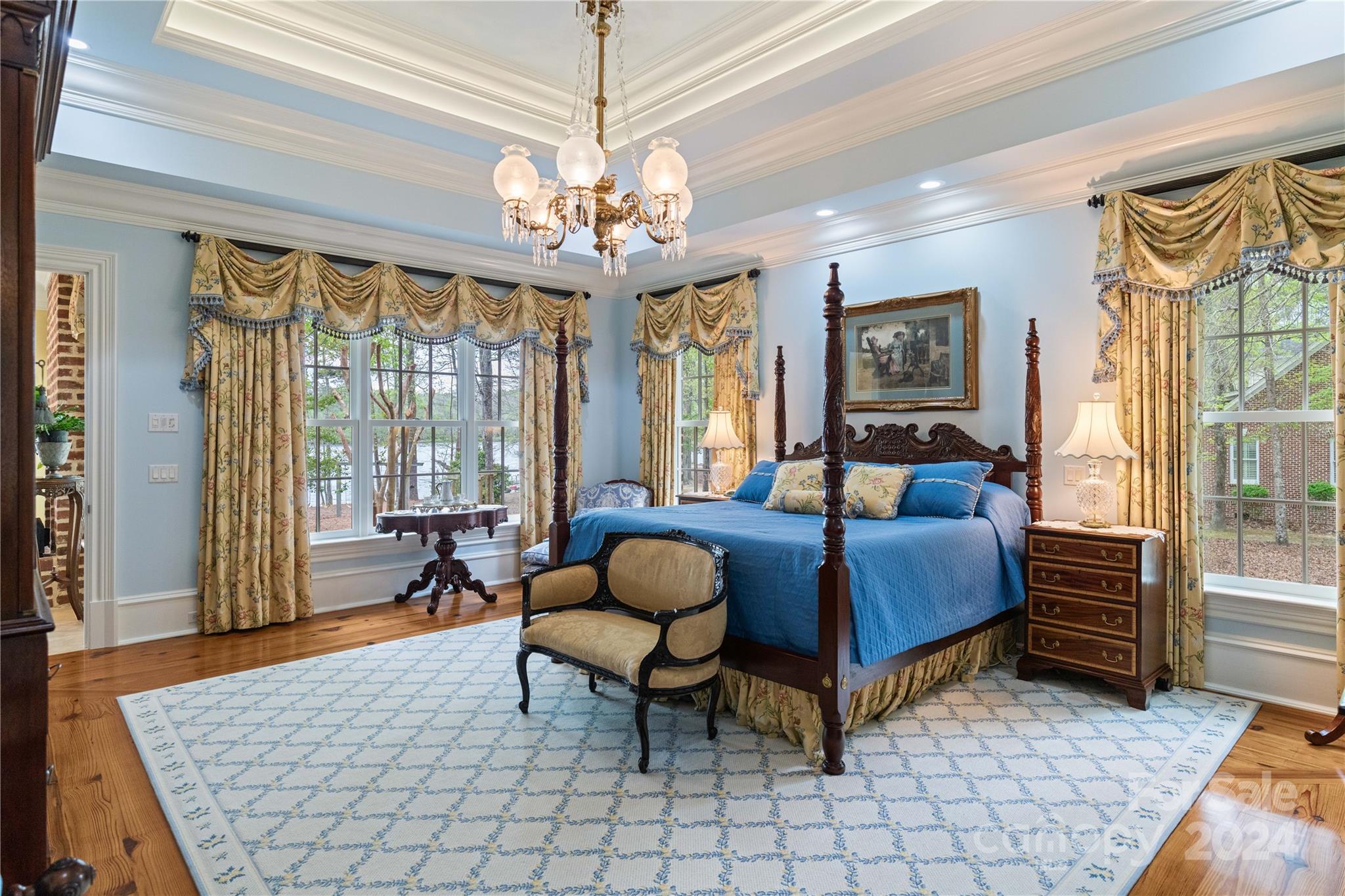 229 Joseph Kershaw Road Eastover, SC 29044 - Photo 14 of 48 a living room with furniture a chandelier and a chandelier
