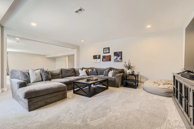 a living room with furniture and a couch