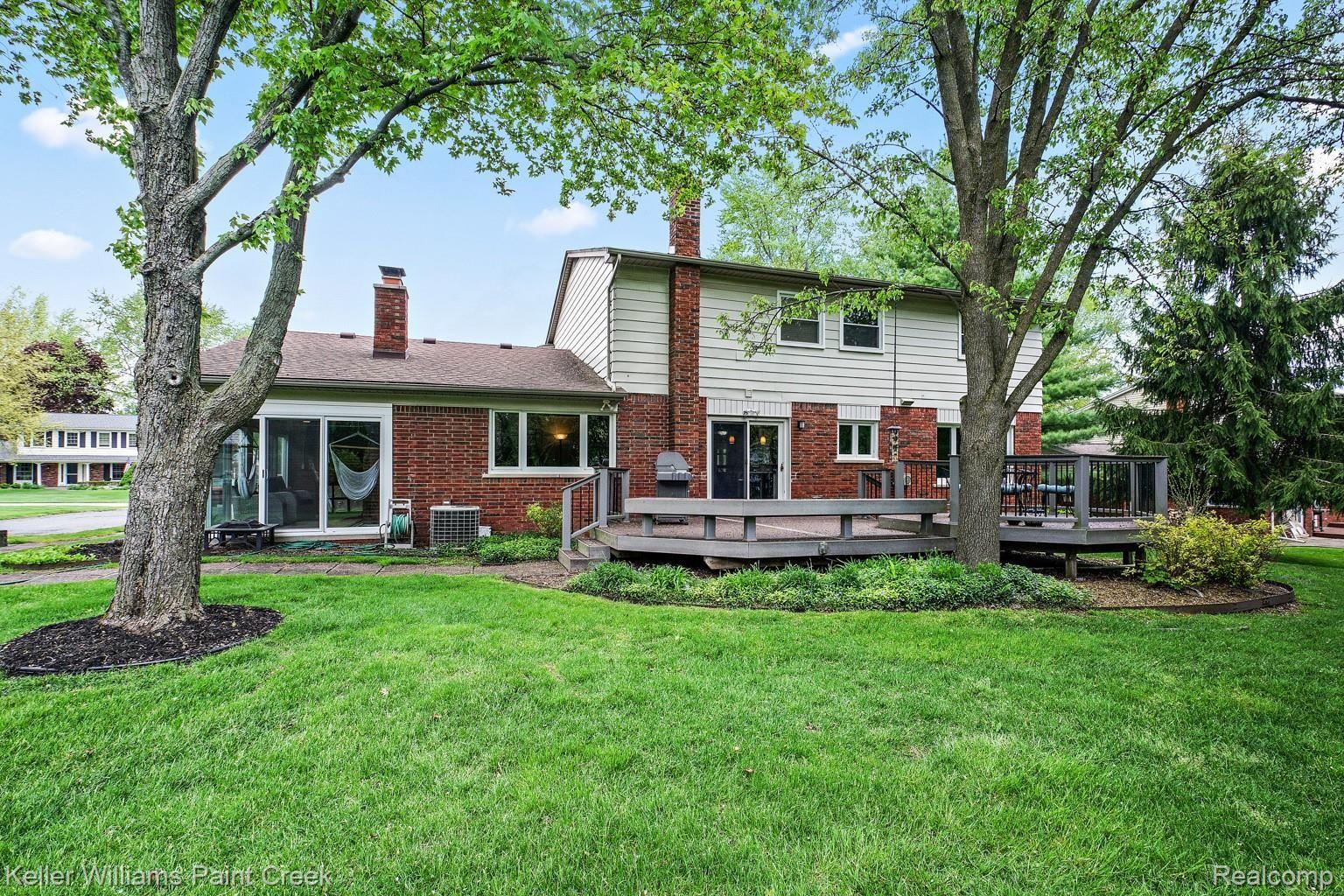 1491 Biggers Drive Rochester, MI 48309 - Photo 8 of 42 Deck is shaded providing a great space to relax outdoors