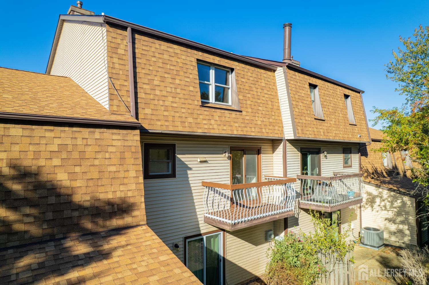 6304 Hana Road Edison, NJ 08817 - Photo 14 of 21 a front view of a house with glass windows