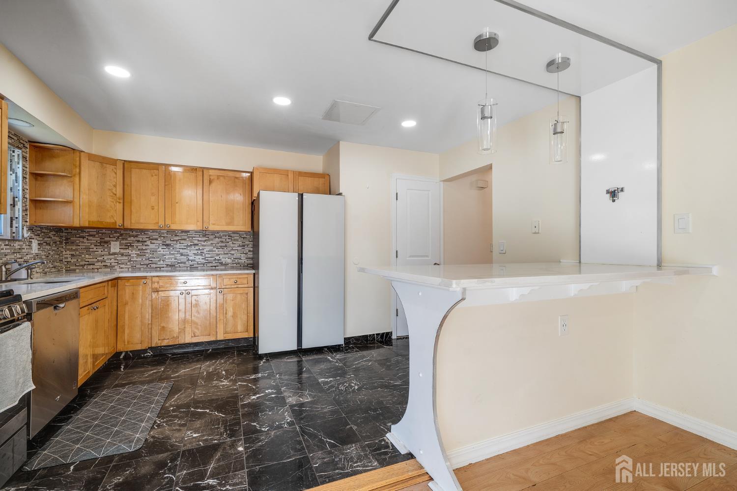 6304 Hana Road Edison, NJ 08817 - Photo 6 of 21 a bathroom with a tub sink and mirror