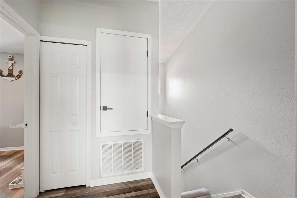 1533 Blue Magnolia Road Brandon, FL 33510 - Photo 20 of 41 a view of front door with wooden floor