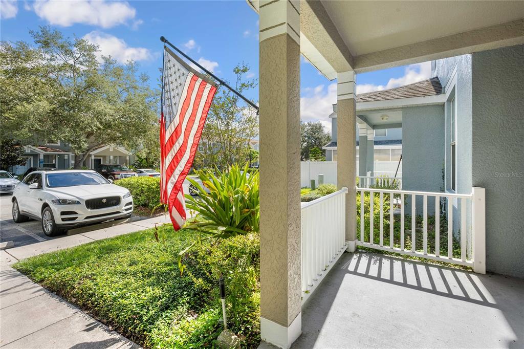 1533 Blue Magnolia Road Brandon, FL 33510 - Photo 3 of 41 a view of a house with a small yard and wooden fence