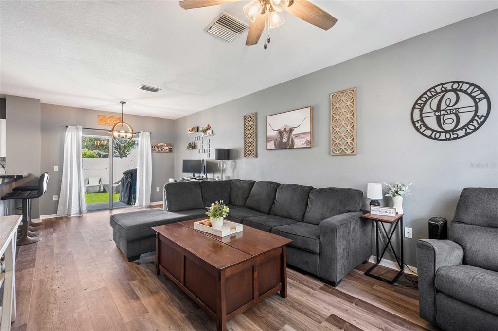 1533 Blue Magnolia Road Brandon, FL 33510 - Photo 7 of 41 a living room with furniture and a large window