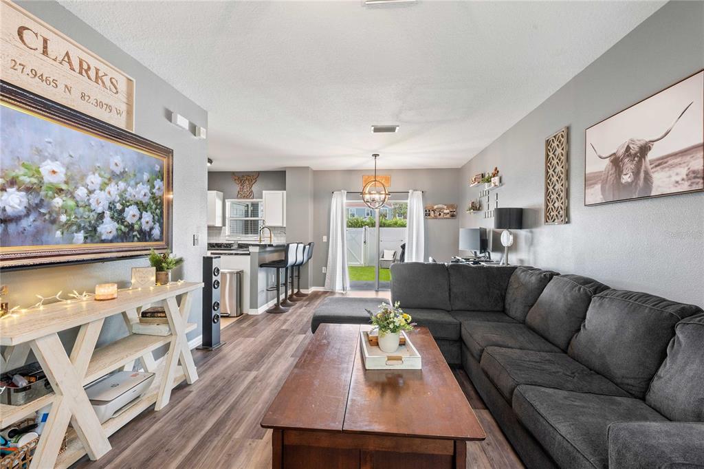 1533 Blue Magnolia Road Brandon, FL 33510 - Photo 8 of 41 a living room with furniture and a large window