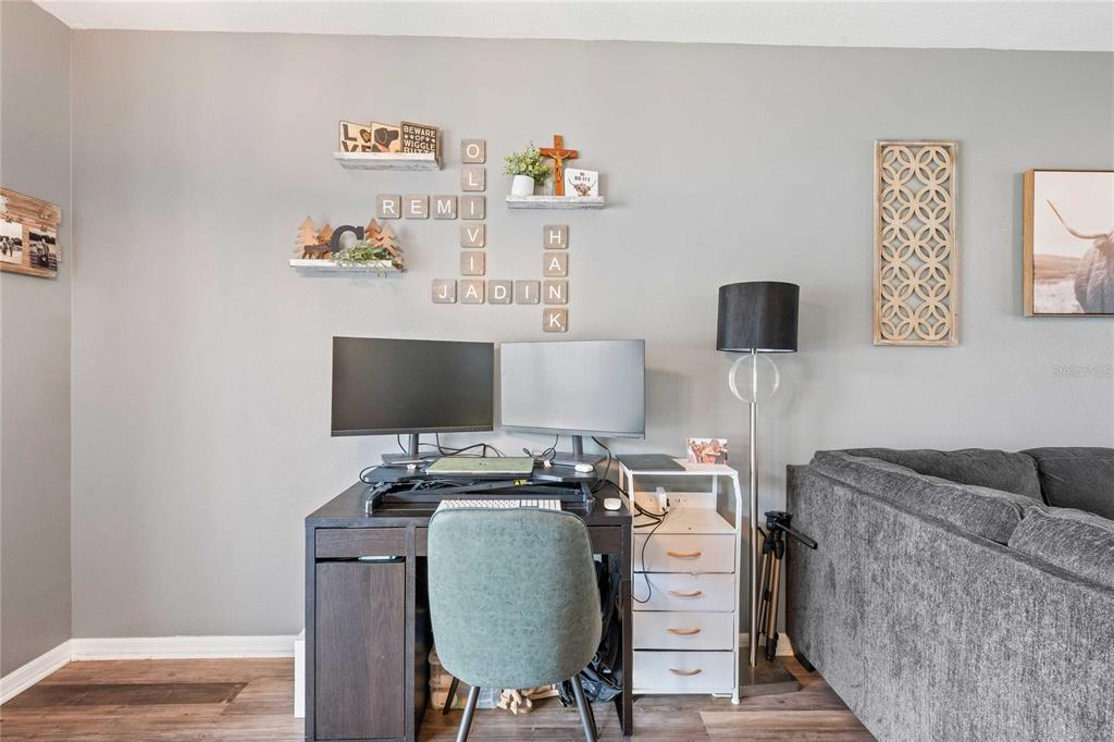 1533 Blue Magnolia Road Brandon, FL 33510 - Photo 10 of 41 a workspace with furniture and couch