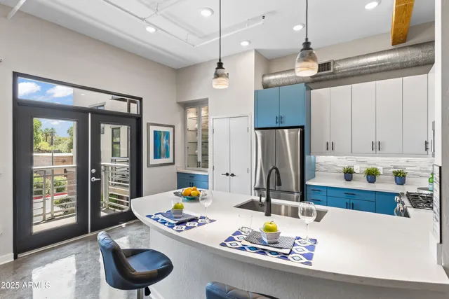 a view of a garden with a building in the background