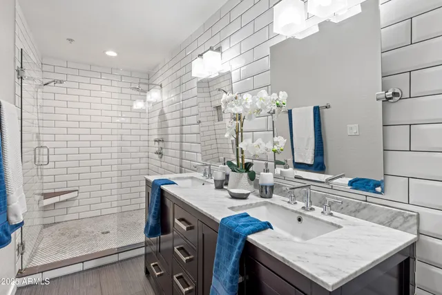a utility room with sink dryer and washer