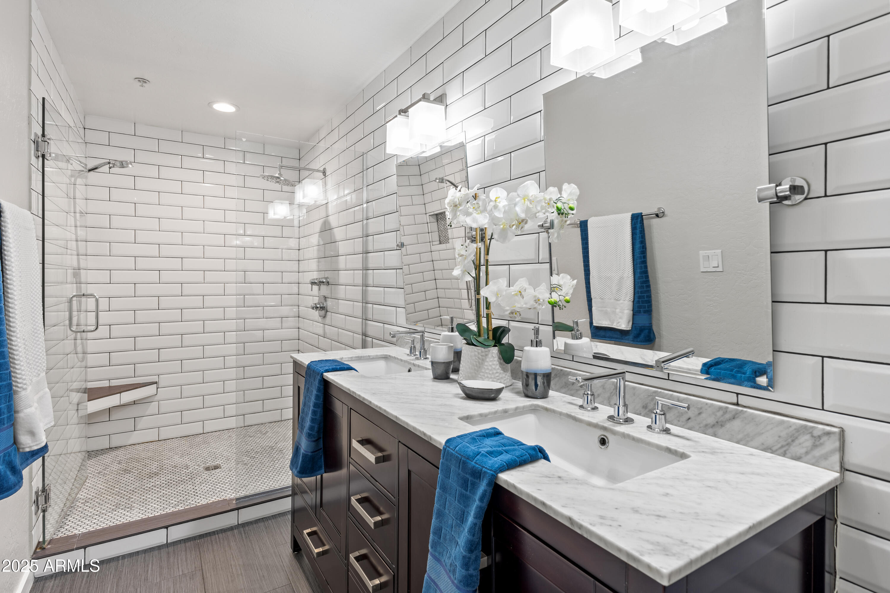 914 East Osborn Road, Unit 208 Phoenix, AZ 85014 - Photo 34 of 53 a bathroom with a sink vanity granite and a mirror
