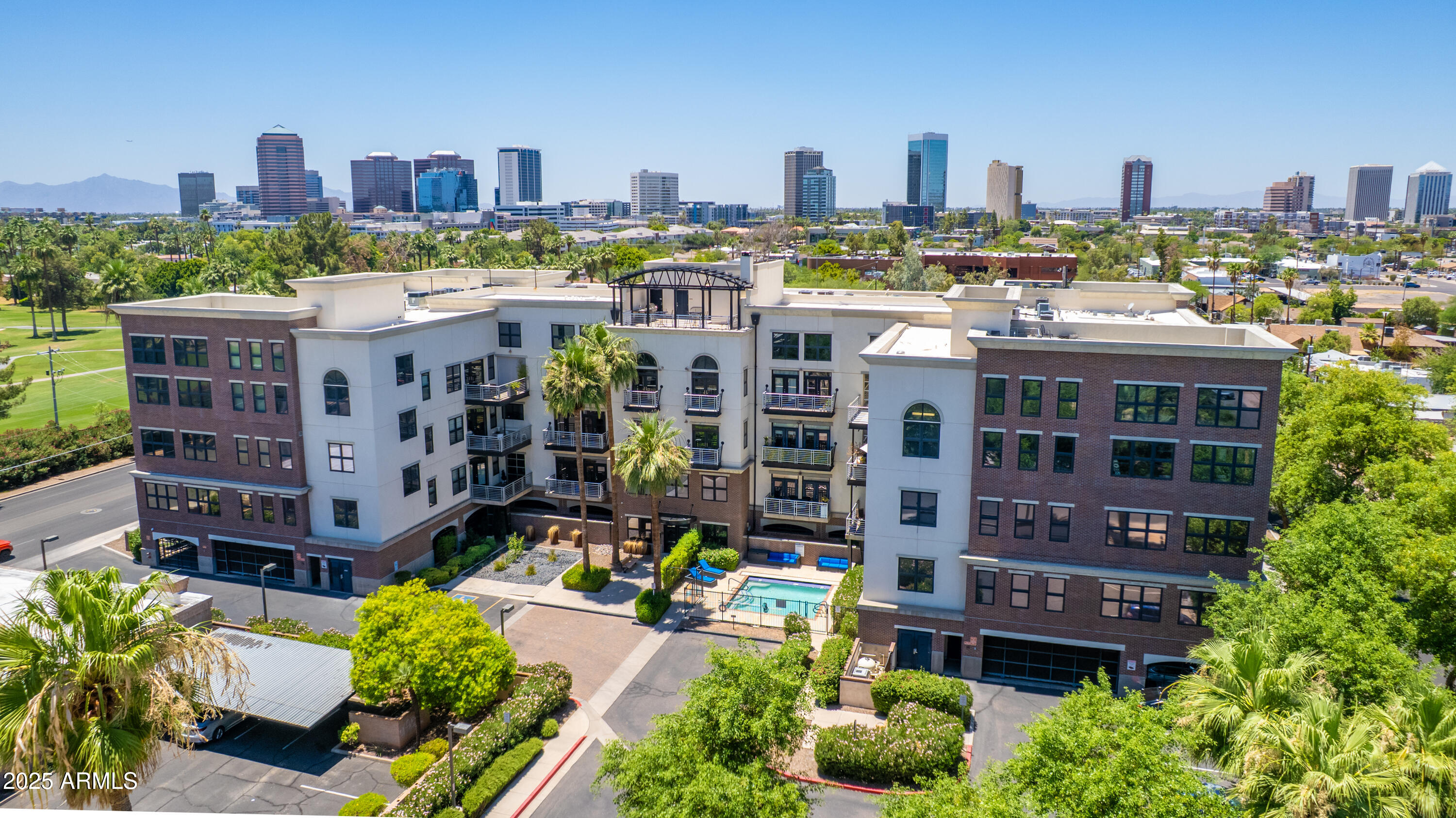 914 East Osborn Road, Unit 208 Phoenix, AZ 85014 - Photo 41 of 53 a view of a city with tall buildings