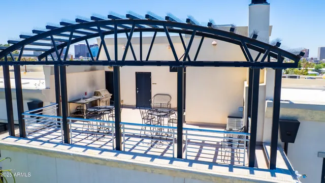 a view of a balcony with chairs