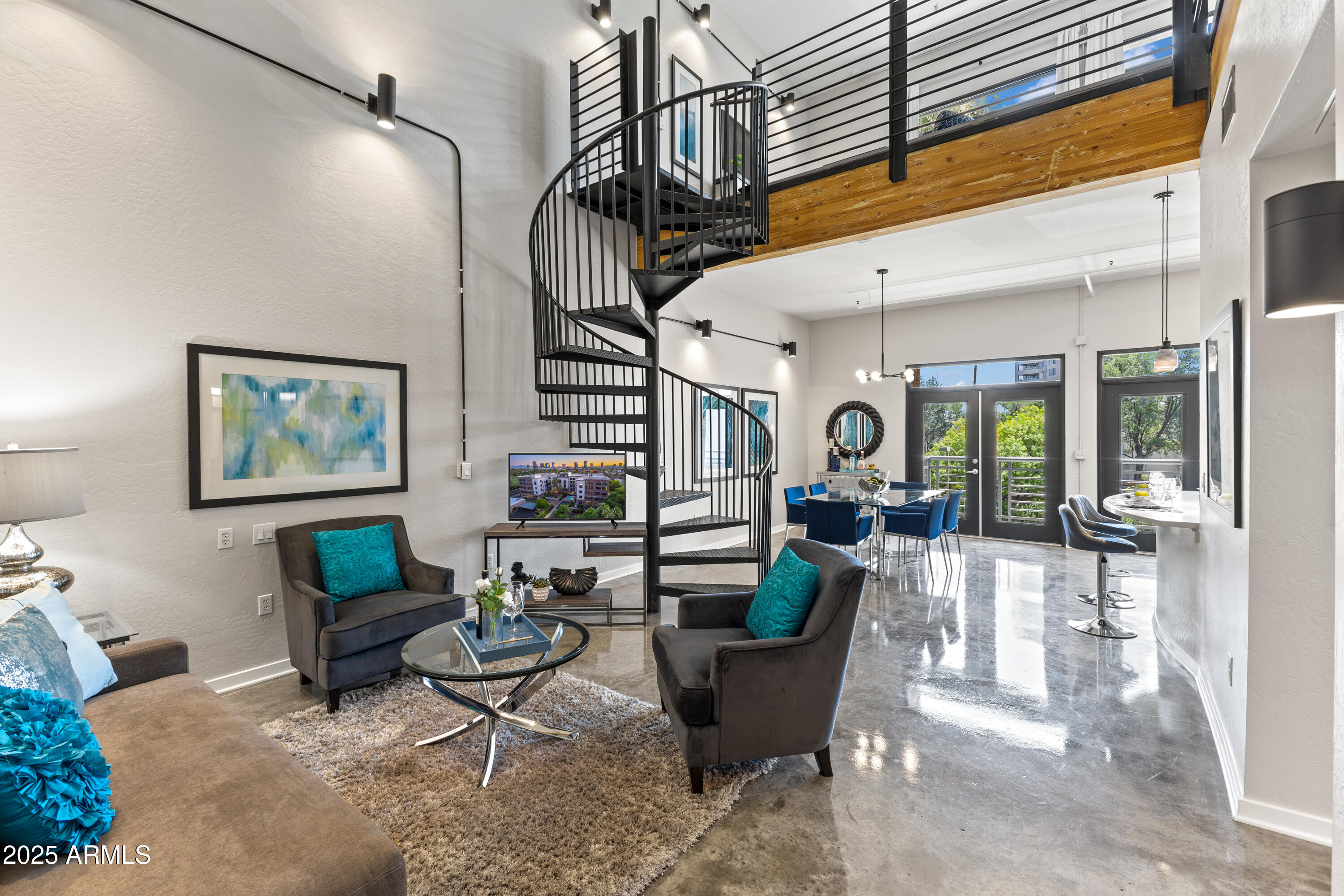 914 East Osborn Road, Unit 208 Phoenix, AZ 85014 - Photo 6 of 53 a living room with fireplace furniture and a wooden floor