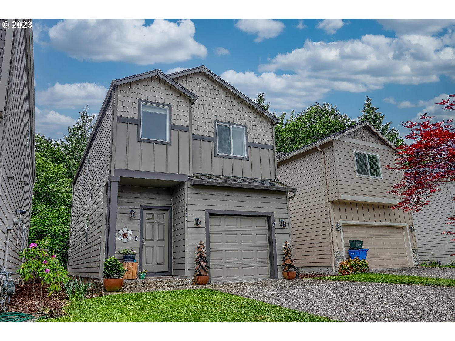 1407 Northeast 170th Circle Ridgefield, WA 98642 - Photo 1 of 42 a view of a yard in front view of a house