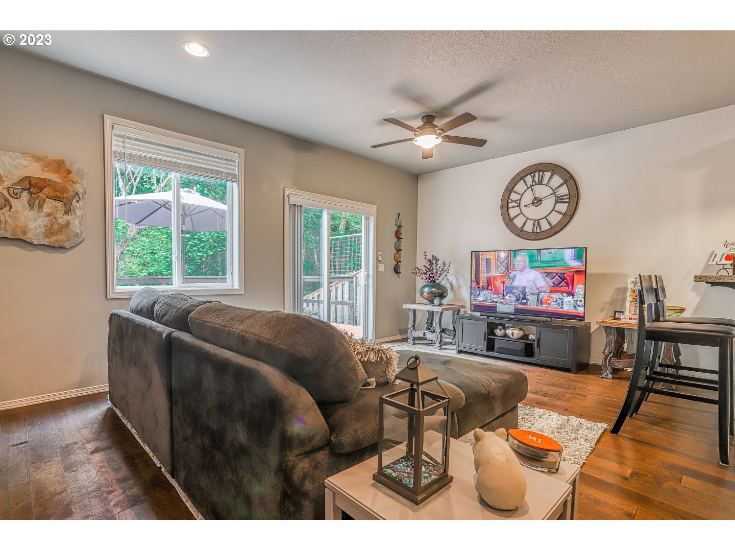 1407 Northeast 170th Circle Ridgefield, WA 98642 - Photo 11 of 42 a living room with furniture a window and a flat screen tv