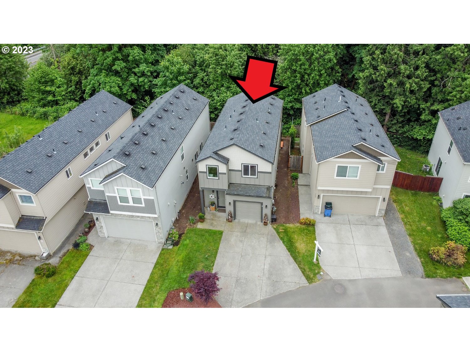 1407 Northeast 170th Circle Ridgefield, WA 98642 - Photo 3 of 42 a aerial view of a house with a yard