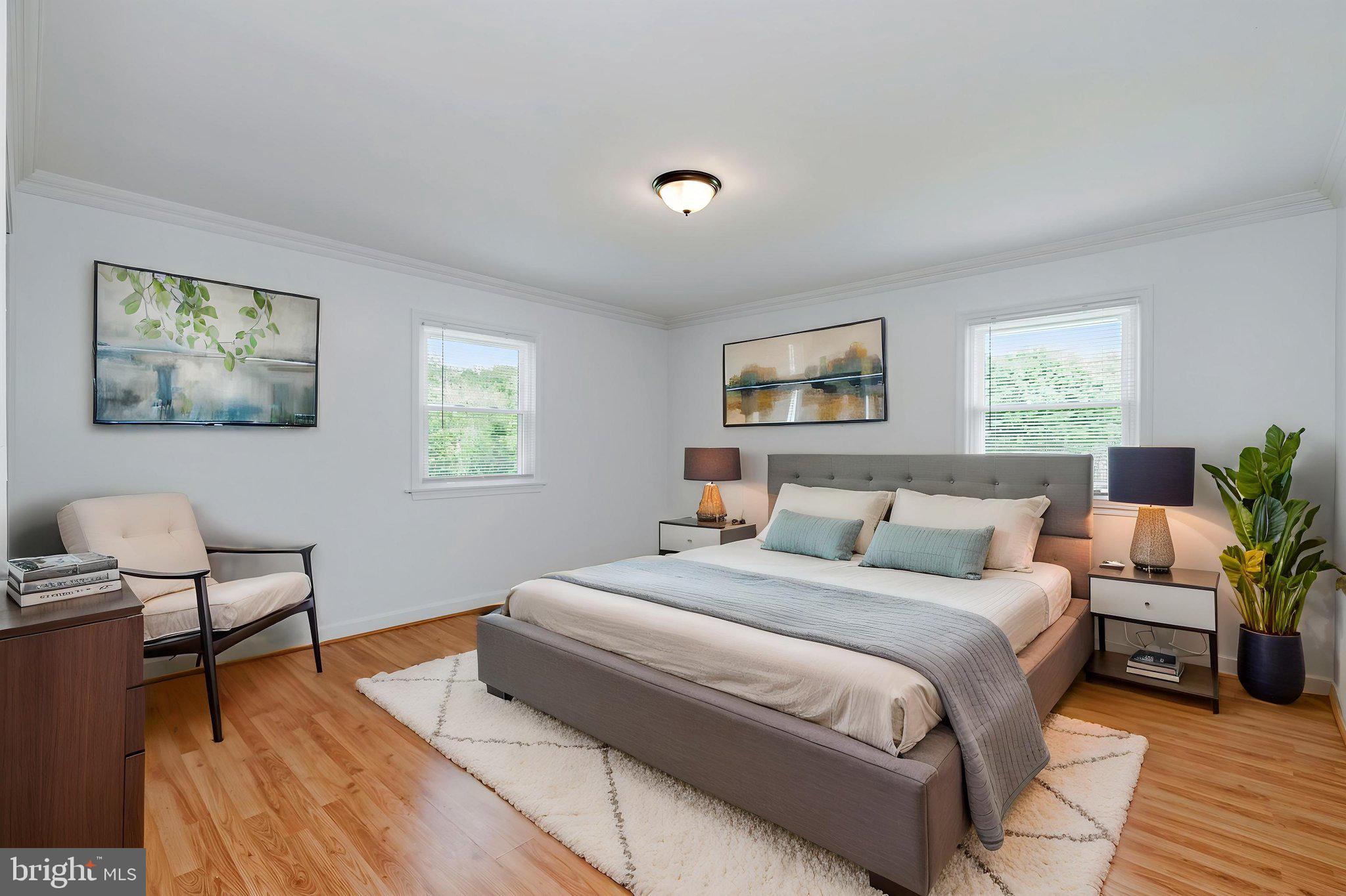 11325 Bacon Race Road Woodbridge, VA 22192 - Photo 27 of 54 a bedroom with a bed and a couch