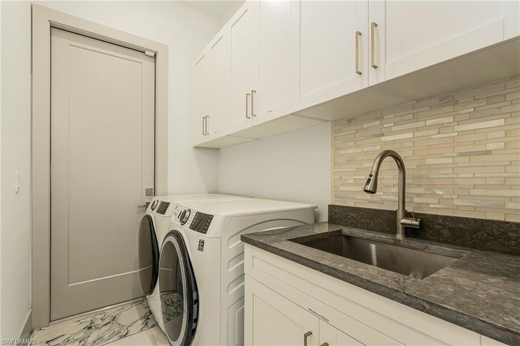 614 105th Avenue North Naples, FL 34108 - Photo 26 of 37 a close view of sink and tap