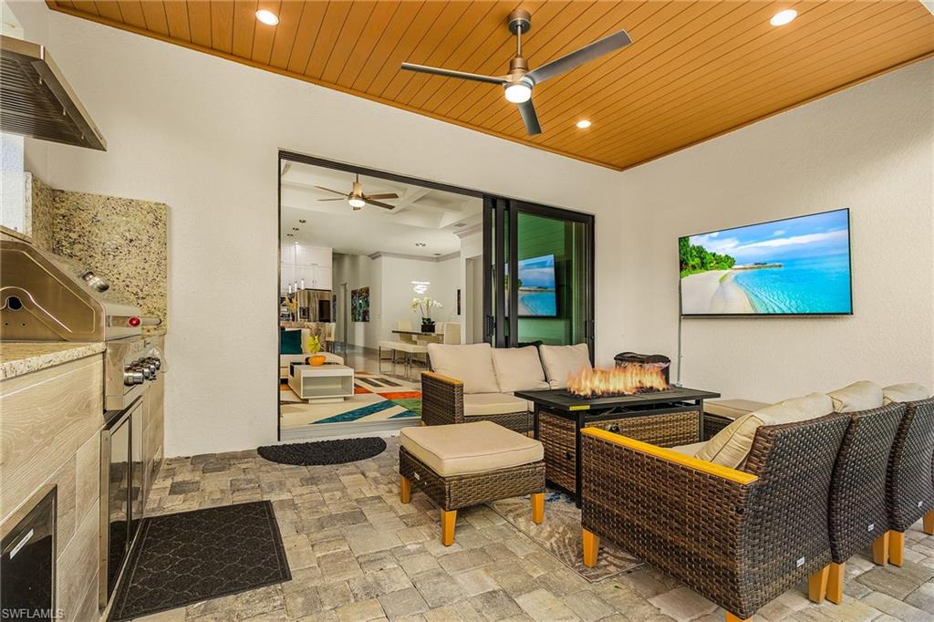 614 105th Avenue North Naples, FL 34108 - Photo 3 of 37 a outdoor space with patio furniture