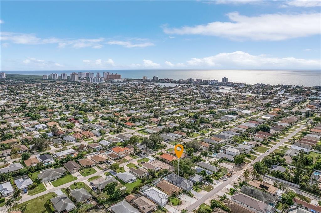 614 105th Avenue North Naples, FL 34108 - Photo 37 of 37 an aerial view of a city