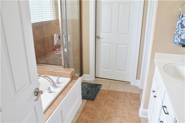 1377 Woods Ferry Road Lebanon, TN 37087 - Photo 9 of 16 Master bathroom with separate garden tub and stand-up shower