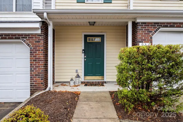 a front view of a house with a garage