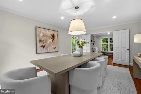 a view of kitchen and dining area with furniture