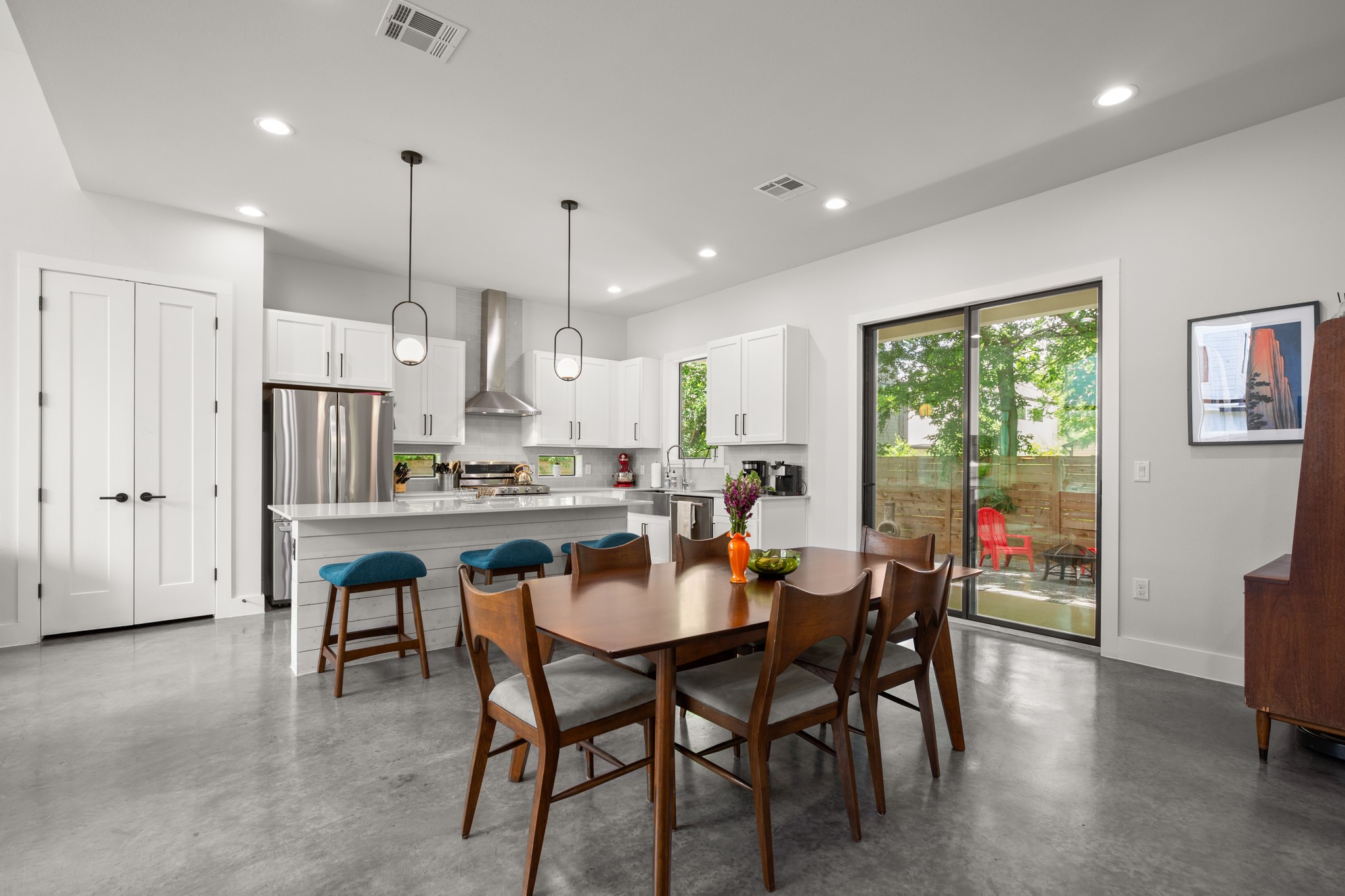 611 Gaylor Street, Unit 2 Austin, TX 78752 - Photo 16 of 31 Dining room featuring concrete floors and recessed lighting