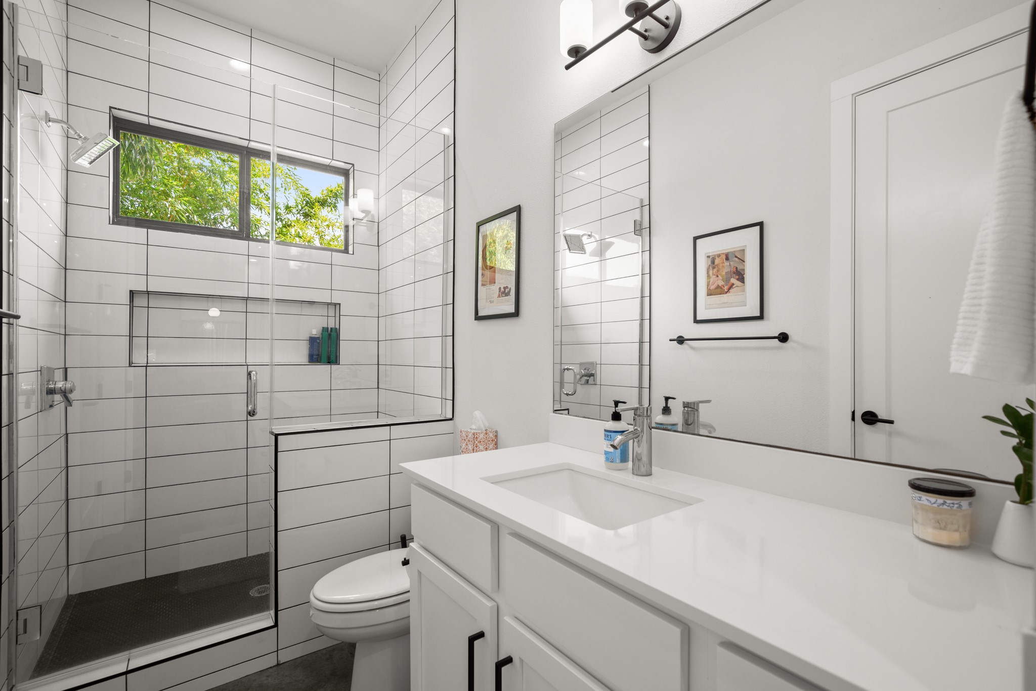 611 Gaylor Street, Unit 2 Austin, TX 78752 - Photo 20 of 31 Bathroom with vanity and a stall shower