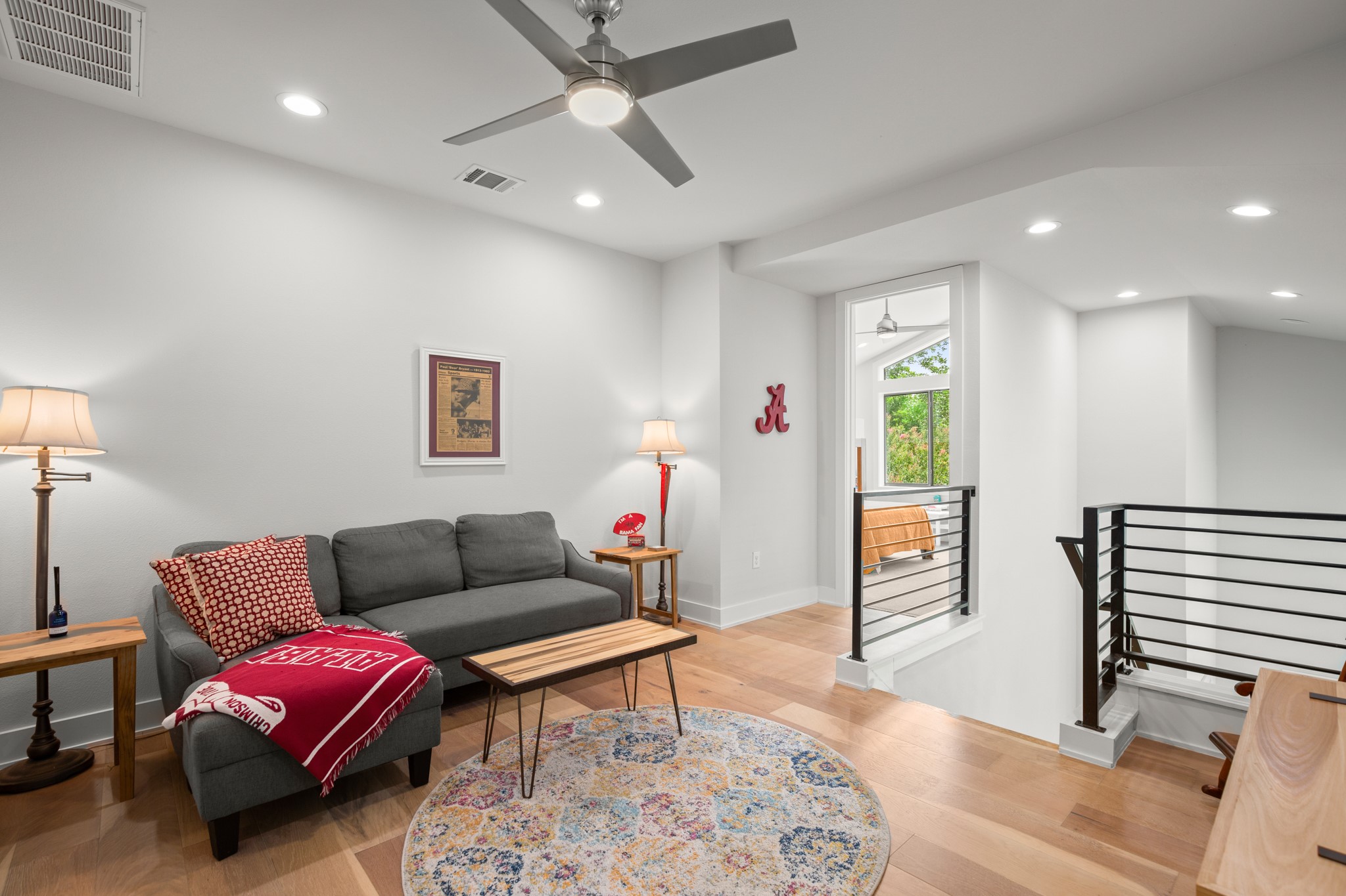 611 Gaylor Street, Unit 2 Austin, TX 78752 - Photo 21 of 31 Sitting room with an upstairs landing, ceiling fan, wood finished floors, and recessed lighting
